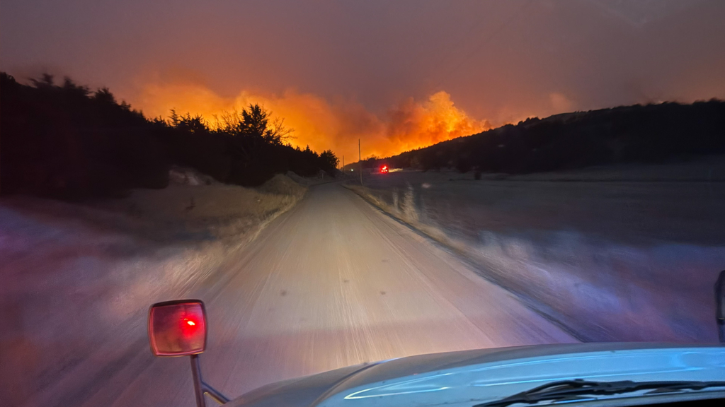 Cottonwood Wildfire burning in the loess hills full of cedar trees